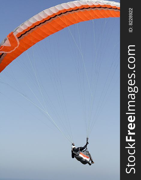 Paragliding over the ocean in Portugal