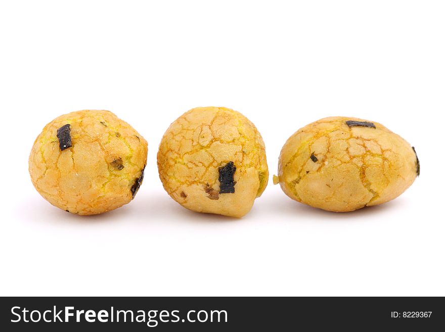 Three seaweed snack balls arranged in row over white background.
