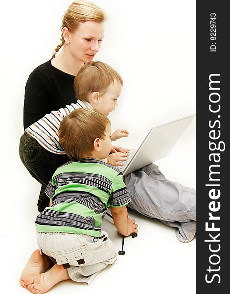 Mother With 2 Children And Laptop