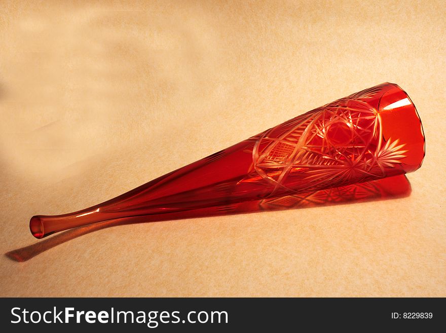 Horn from red glass with a manual diamond facet