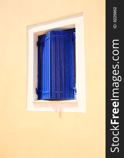 Blue window shutters in Kefalonia Greece