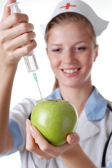 Nurse With Syringe And Apple Royalty Free Stock Photos Nurse With Syringe And Apple Royalty Free Stock Photos