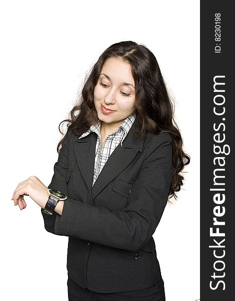 Young businesswoman looking her watch