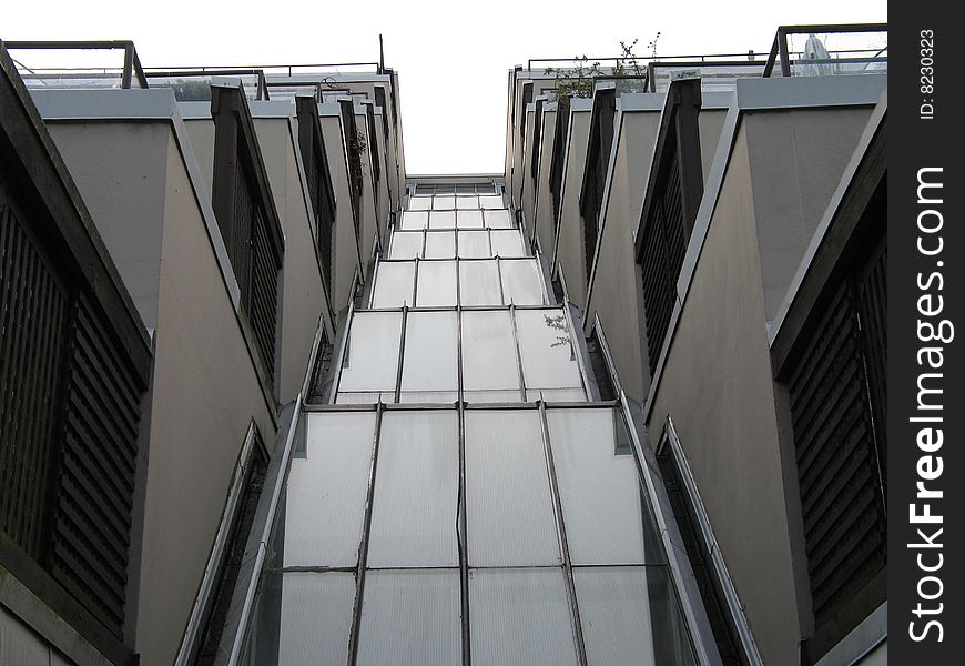 Modern glass building with balconies