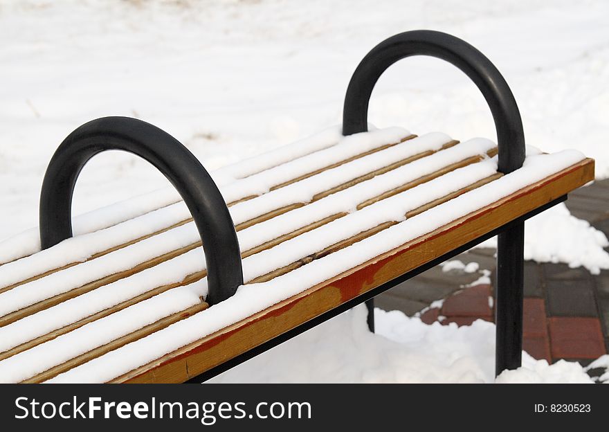 A bench on the snowfield