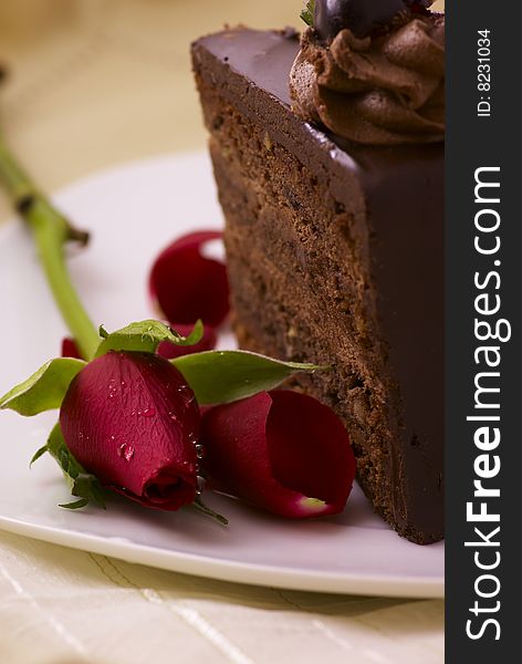 Chocolate cake with red rose