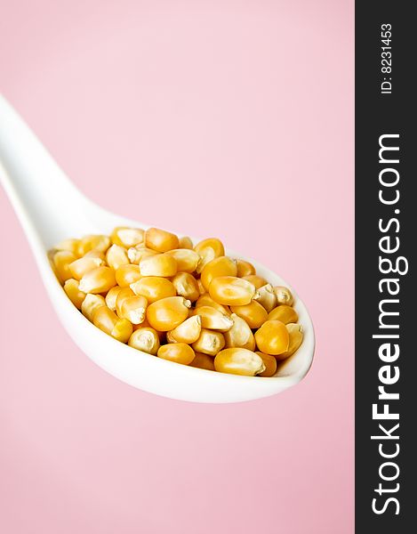 Image of popcorn with pink background