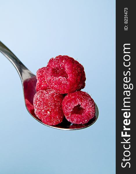 Image of raspberries on a spoon