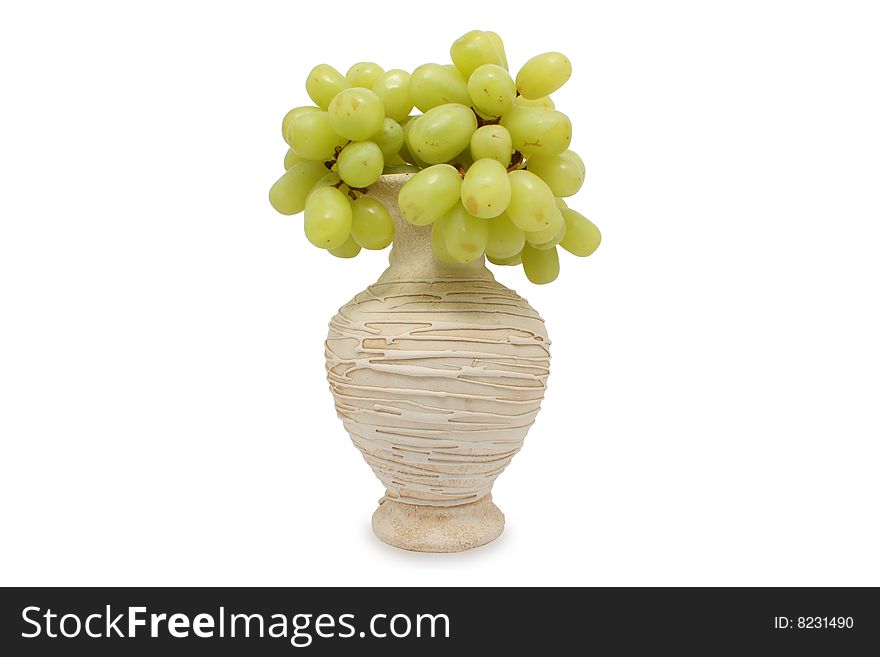 Vase with a grape on a white background