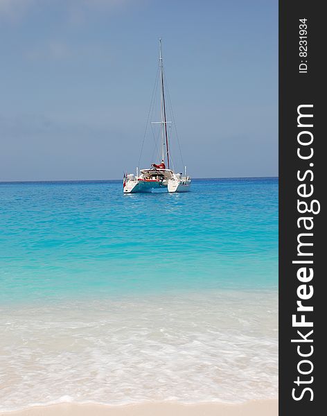 Wreck Bay on Zakynthos Island - Greece. Blue sea, yacht and white sandy beach. Wreck Bay on Zakynthos Island - Greece. Blue sea, yacht and white sandy beach.