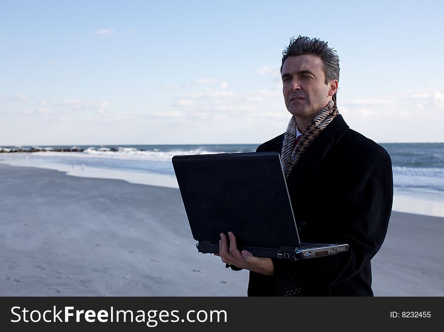 Businessman On The Beach