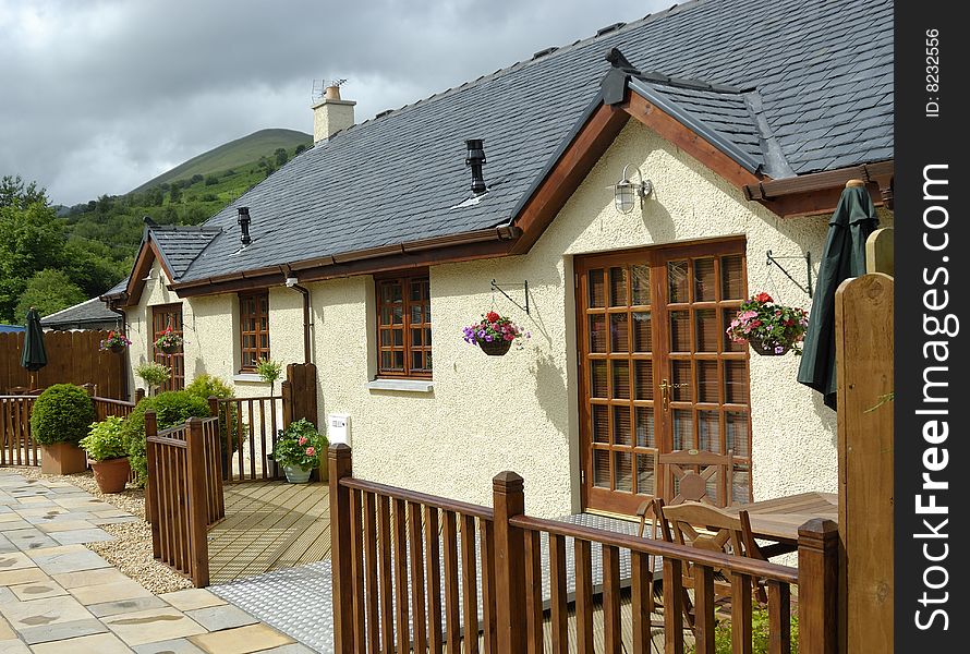 A porch by a house in Scotland during the summer