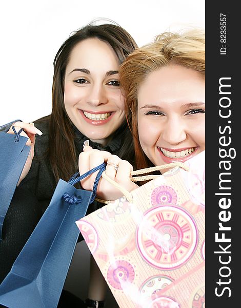 Two beautiful smiling young woman with shopping, gift bag. Two beautiful smiling young woman with shopping, gift bag