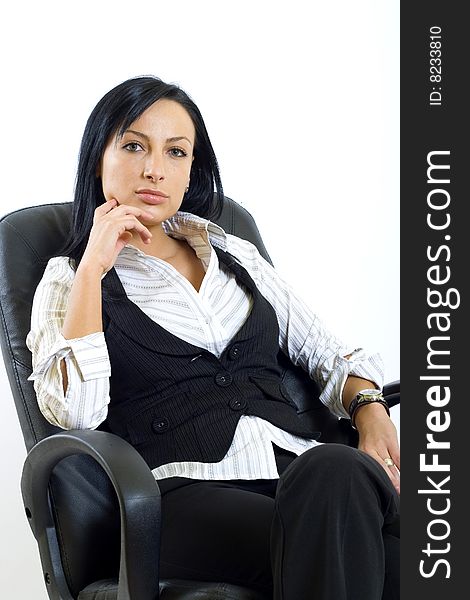 Attractive business woman in office chair