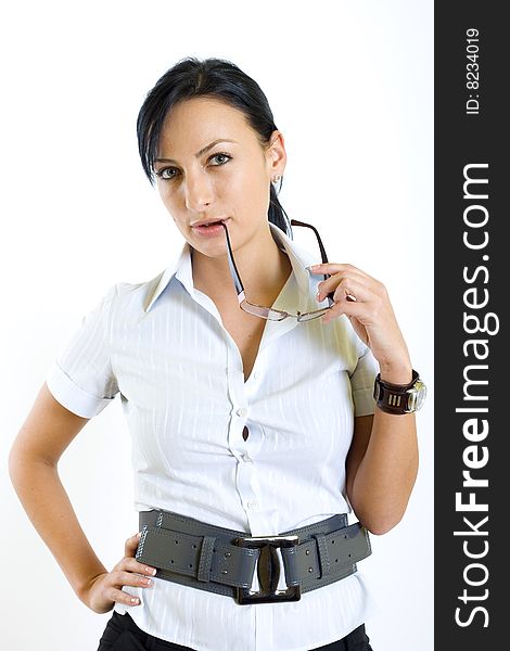 Attractive businesswoman holding her glasses