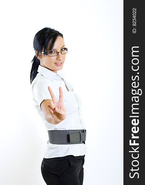 Attractive businesswoman with glasses victory sign. Attractive businesswoman with glasses victory sign