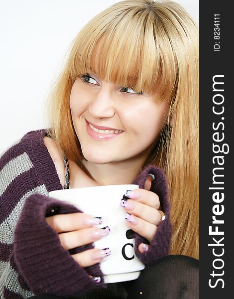 Young beautiful woman with cup of tea