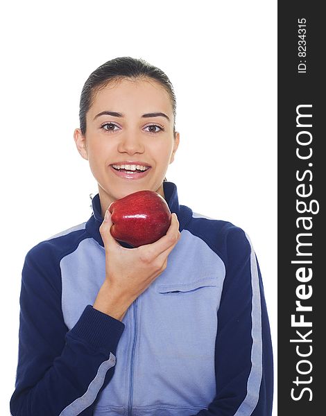 Portrait of smiling young woman holding apple, isolated on white background