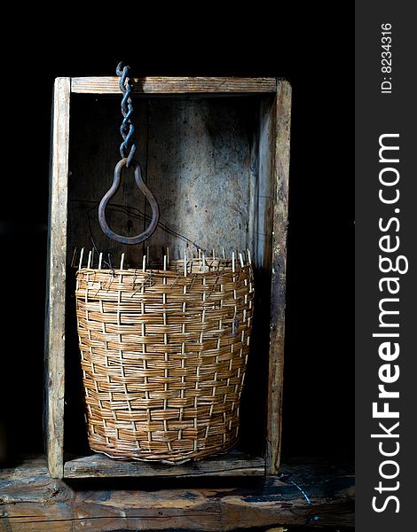 Stock photo: an image of a wicker basket in a woden box