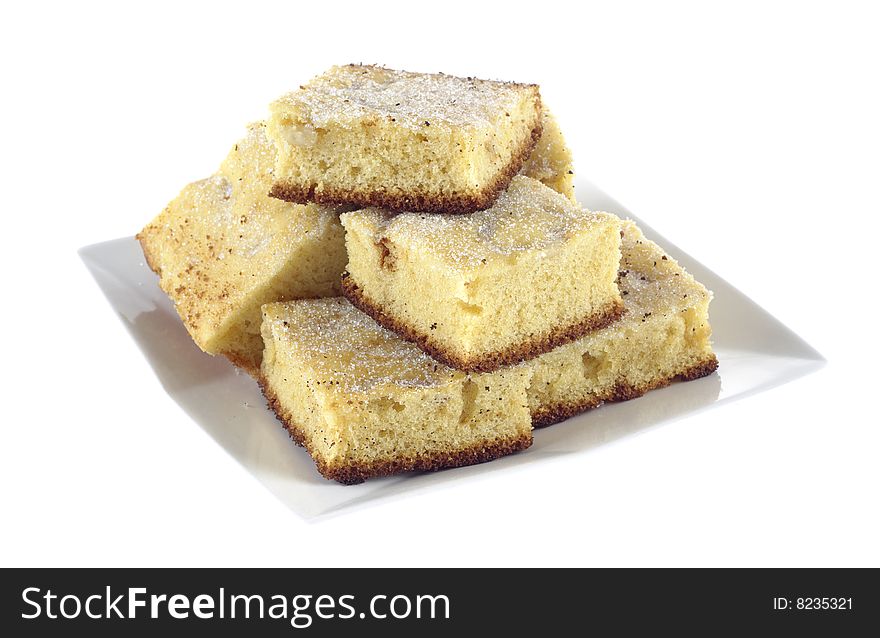 Stack of delicious cake on square plate. Stack of delicious cake on square plate
