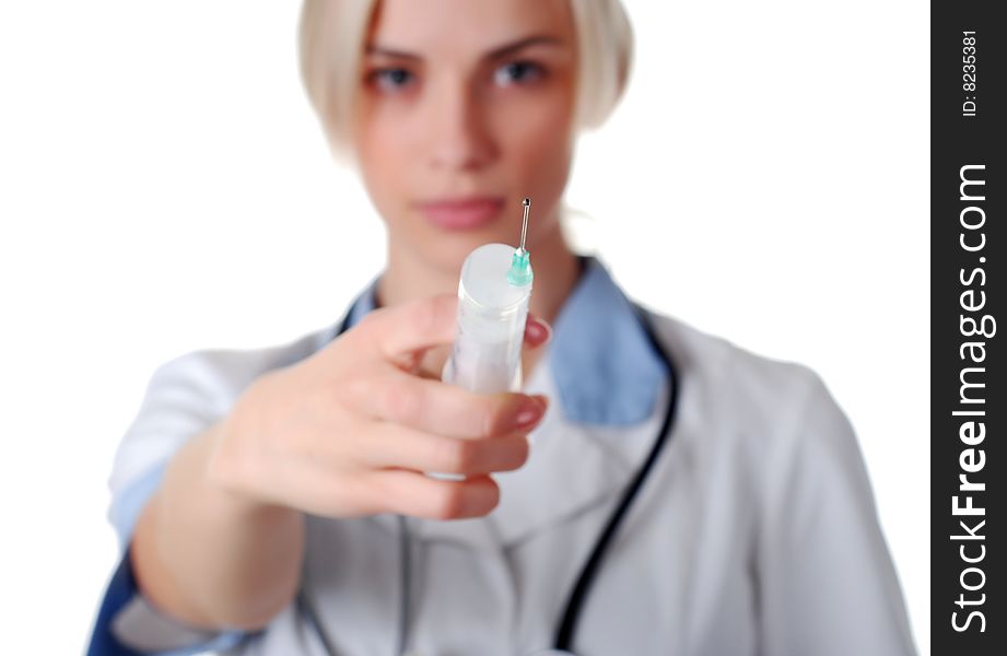 Beautiful nurse with syringe on white background