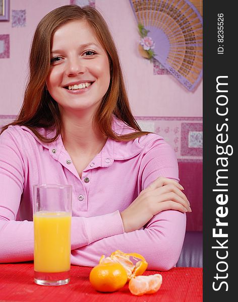 Portrait of woman with glass of orange juice. Portrait of woman with glass of orange juice