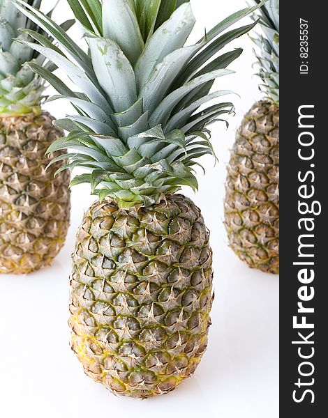 Big pineapples on white background