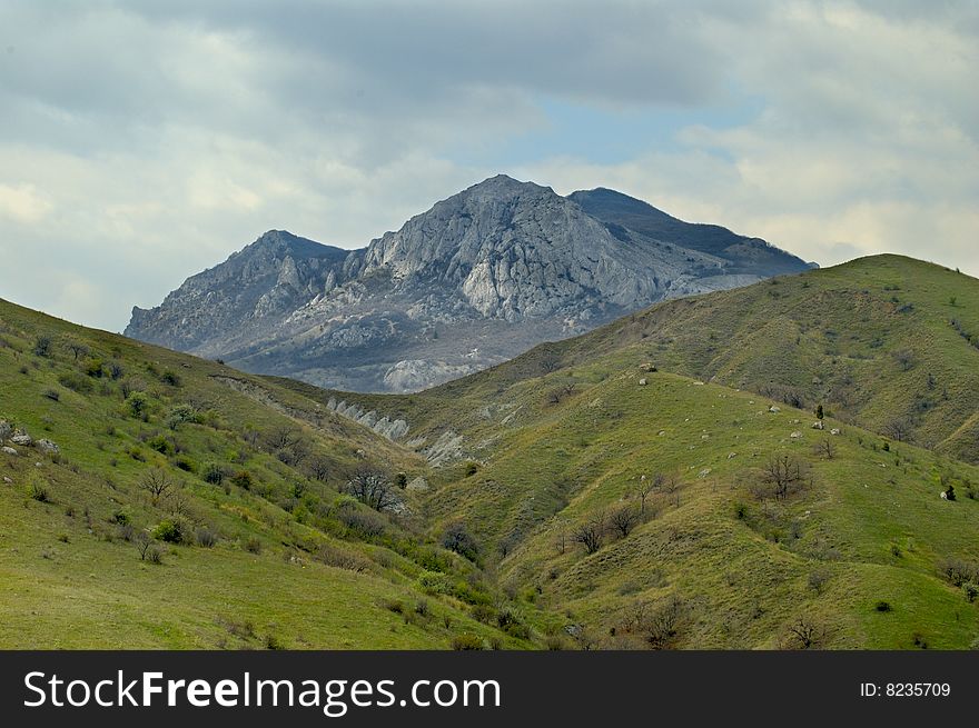 Crimean mountains in spring, cloudy sky