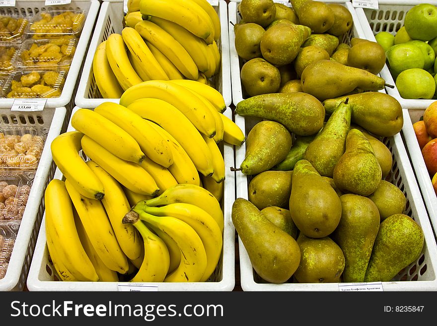 Bananas and pears in the stores