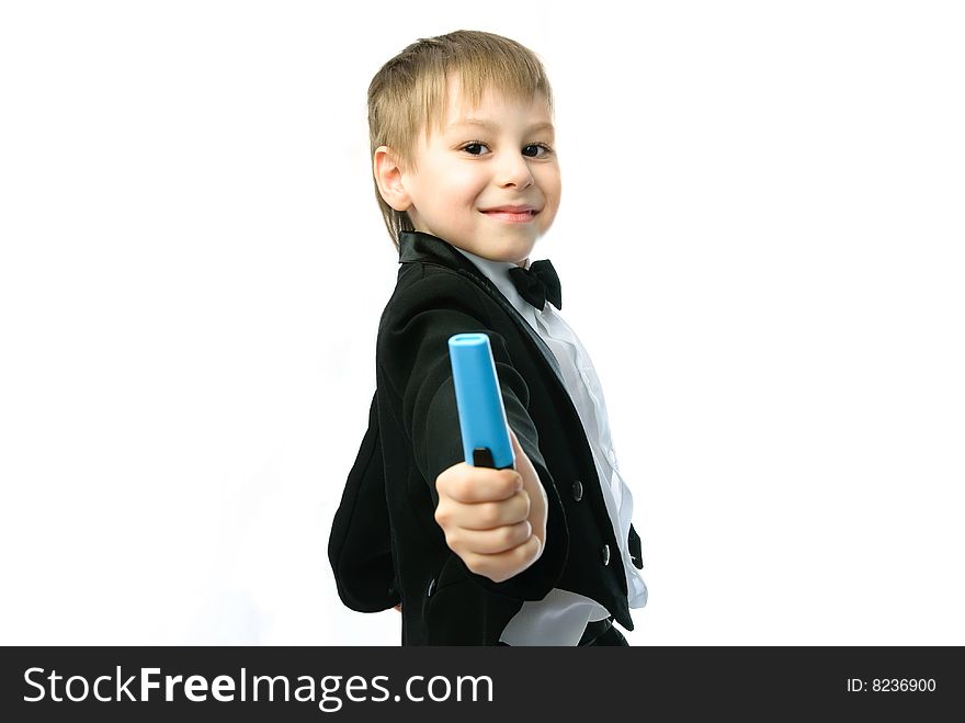 Happy little schoolboy with a felt-tip pen against white background. Happy little schoolboy with a felt-tip pen against white background