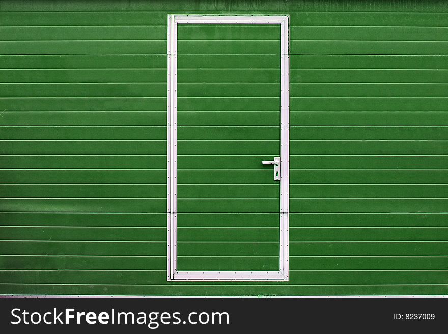 Simple metal door in colored wall (different colors are available). Simple metal door in colored wall (different colors are available)