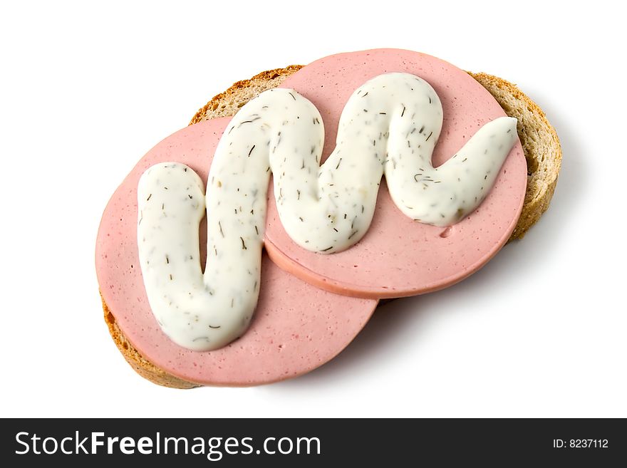 Sandwich with sausage and mayonnaise (isolated on white)