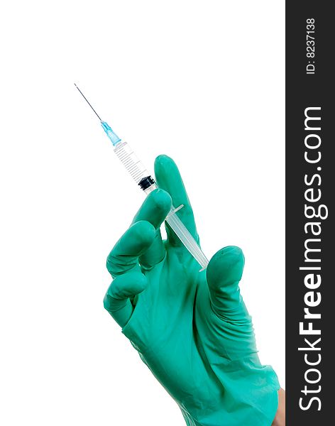 Syringe in a hand ready for injection isolated over white