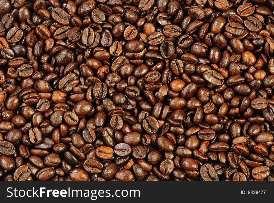 Coffee grains as brown textured background