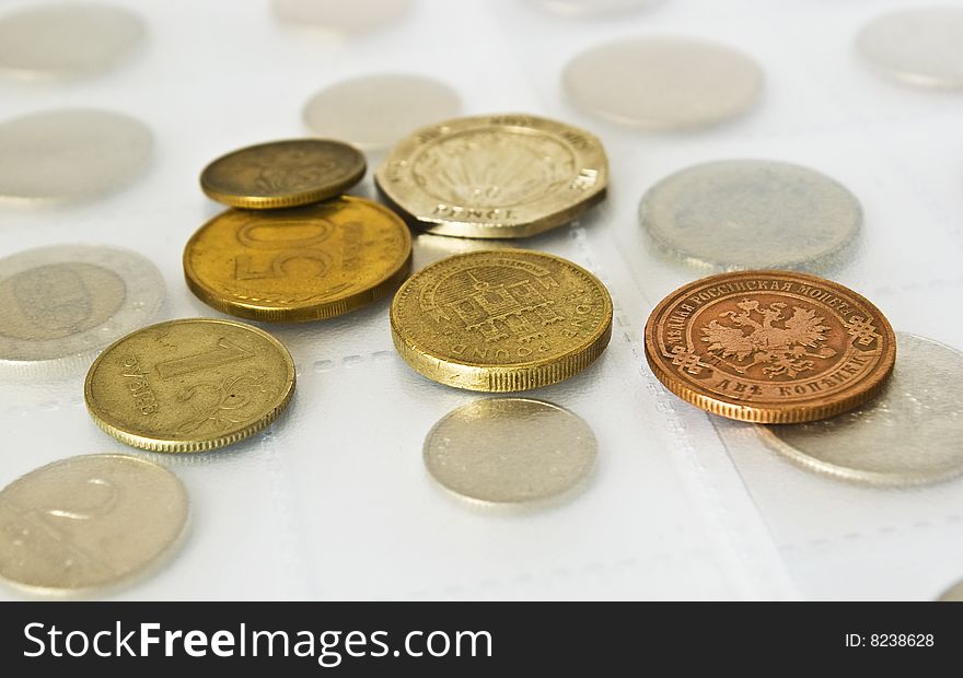 Old coins collection isolated on white background. Old coins collection isolated on white background