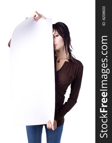 The young beautiful businesswoman at office behind work on a white background. The young beautiful businesswoman at office behind work on a white background