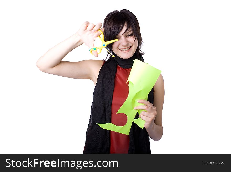 The young beautiful businesswoman at office behind work on a white background. The young beautiful businesswoman at office behind work on a white background