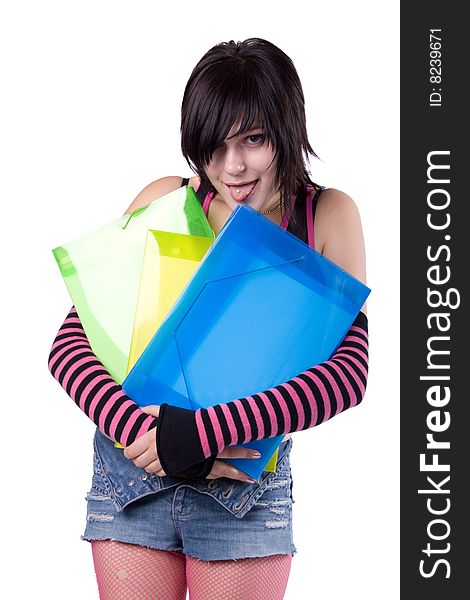 The young beautiful businesswoman at office behind work on a white background. The young beautiful businesswoman at office behind work on a white background