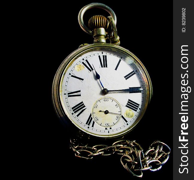 Antique pocket watch and chain. The dial is damaged. Roman numerals. separate second hand. Isolated on black.