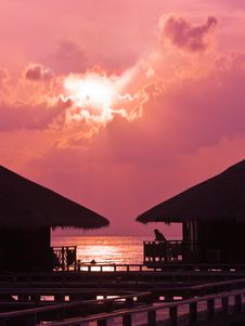 Human Silhouette In Water Bungalow At Sunset Stock Images Human Silhouette In Water Bungalow At Sunset Stock Images