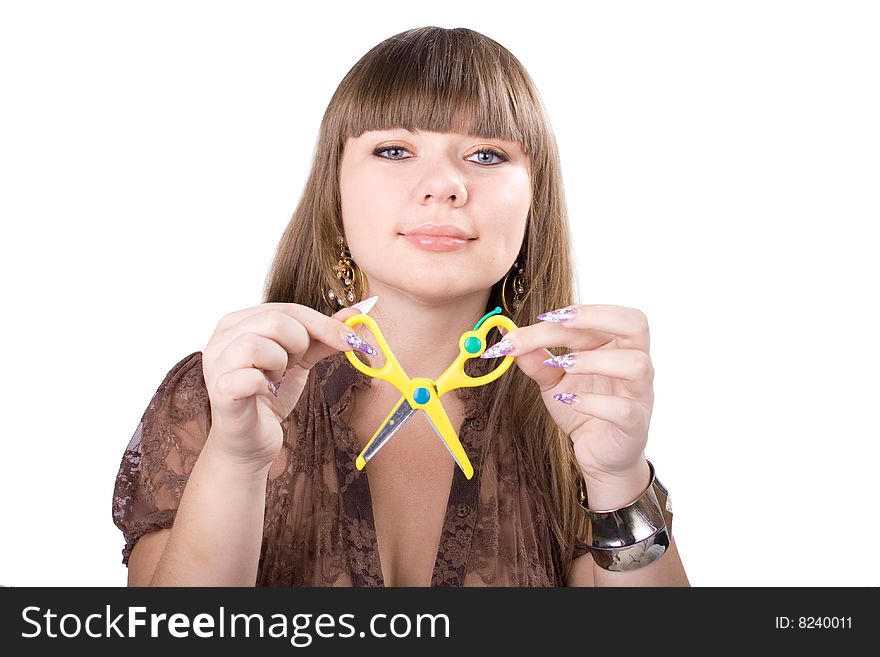 The young beautiful businesswoman at office behind work on a white background. The young beautiful businesswoman at office behind work on a white background