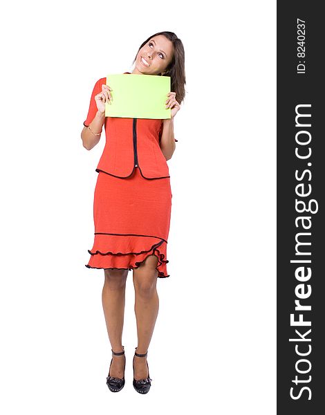 The young beautiful businesswoman at office behind work on a white background. The young beautiful businesswoman at office behind work on a white background