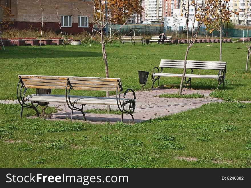 Two benches - vacation spot. Russia, Moscow.
