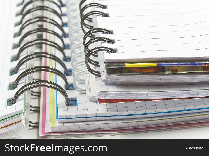 Three opened notebooks with with black and white spiral. Three opened notebooks with with black and white spiral