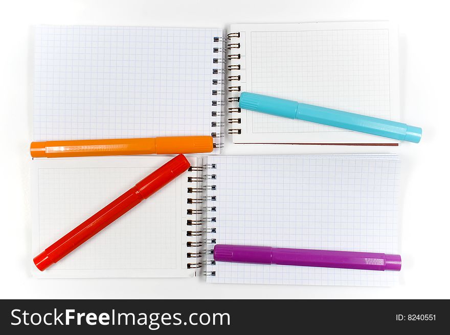 Four opposite notebook with spiral and felt-tips pencils