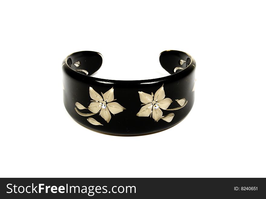 Black bracelet with decoration from flowers and gems