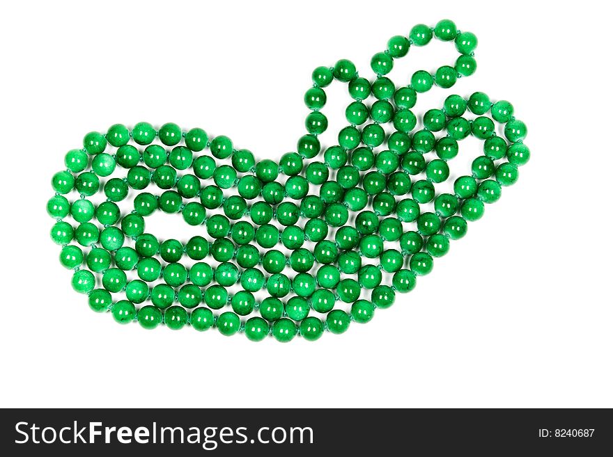 Necklace from gems green color on white