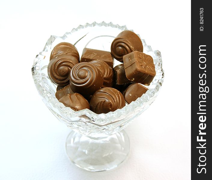 Vase with tasty chocolates inside