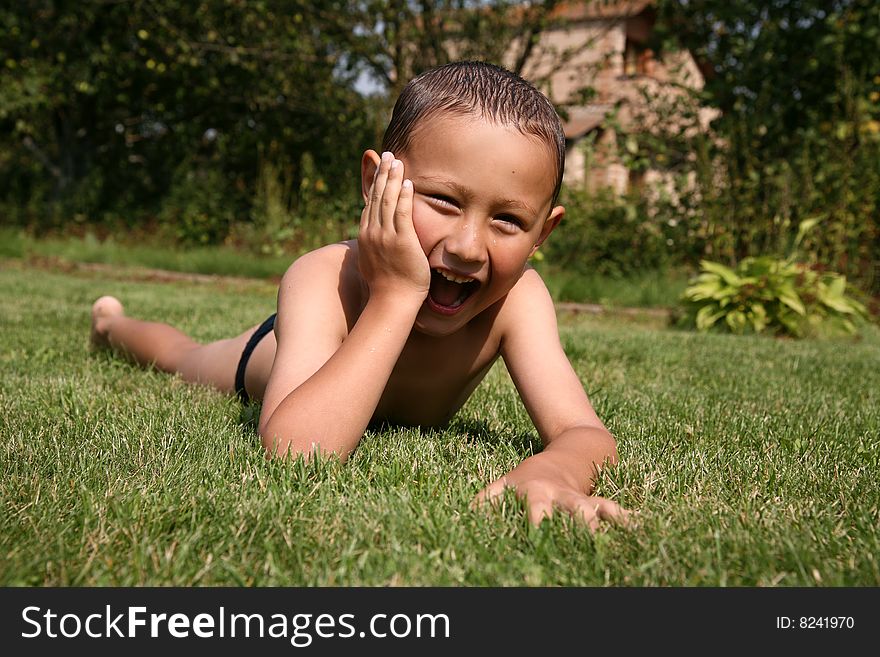 Boy in green grass