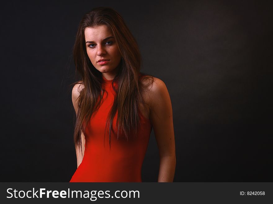 Young attractive girl in the soft studio light. Young attractive girl in the soft studio light.